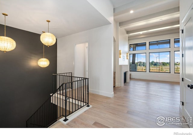 hallway with light wood-type flooring