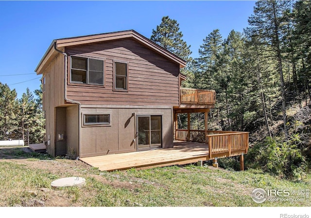 rear view of house with a deck