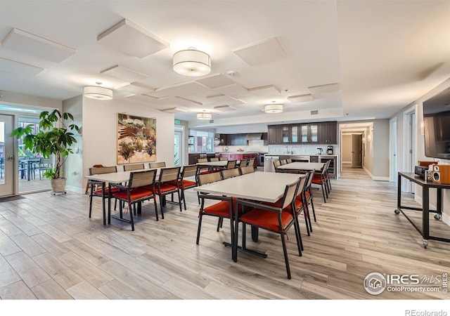 dining room with light hardwood / wood-style floors