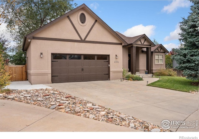 view of front facade with a front lawn and a garage