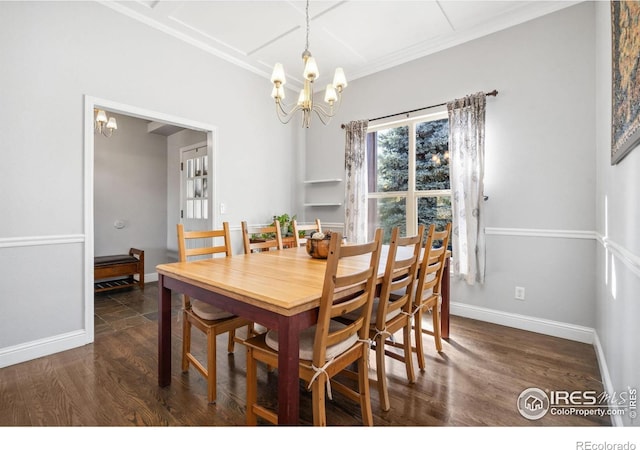 dining space featuring dark wood-type flooring, a notable chandelier, and crown molding