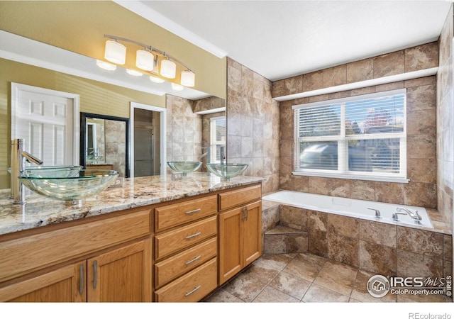 bathroom with vanity, plus walk in shower, tile patterned floors, and tile walls