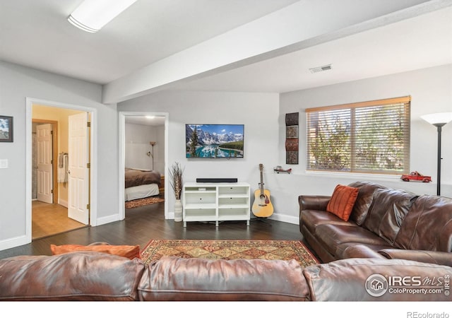 living room with dark wood-type flooring