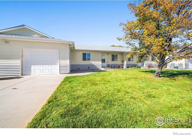 ranch-style house with a front yard and a garage