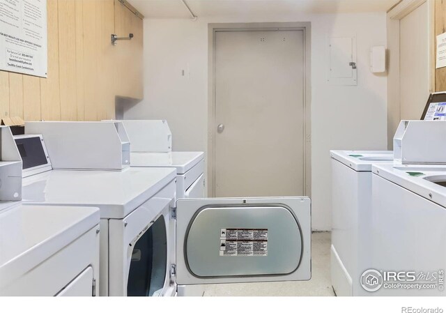 2707 Valmont Rd Unit 110B, Boulder, CO 80304 - clothes washing area featuring electric panel and washing machine and clothes dryer