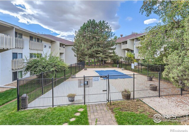 2707 Valmont Rd Unit 110B, Boulder, CO 80304 - view of swimming pool with a lawn