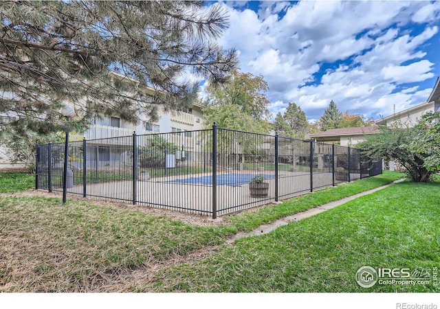 2707 Valmont Rd Unit 110B, Boulder, CO 80304 - view of tennis court with a yard and a covered pool