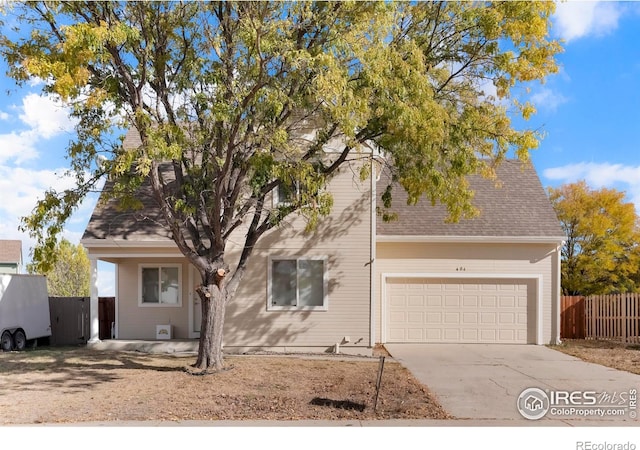 view of front of property featuring a garage