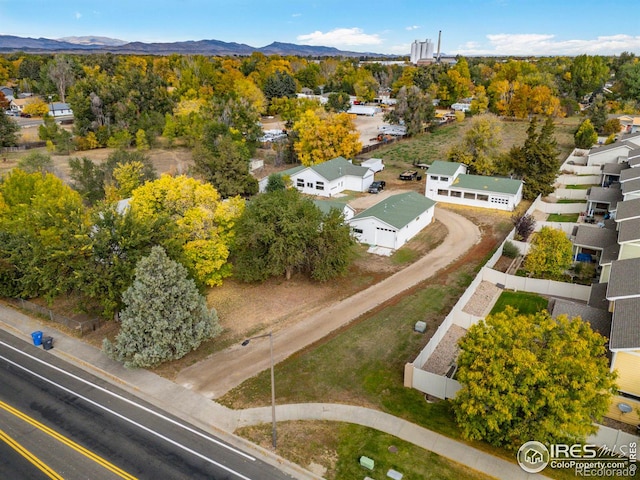 1601 E 1st St, Loveland, CO 80537 - aerial view of residential area featuring a mountain backdrop
