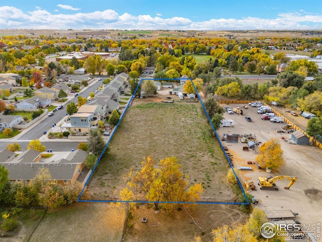 1601 E 1st St, Loveland, CO 80537 - aerial view of residential area with property parcel outlined
