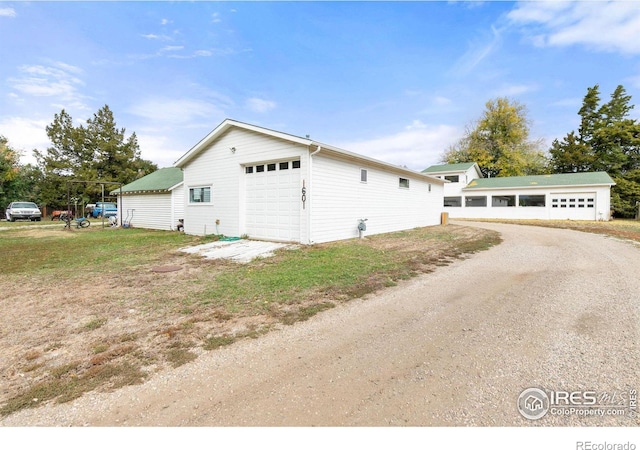 view of home's exterior with a garage