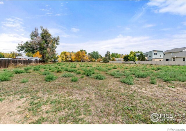 1601 E 1st St, Loveland, CO 80537 - view of yard featuring fence