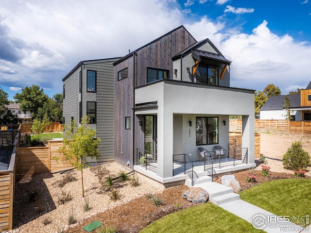 contemporary home featuring a balcony