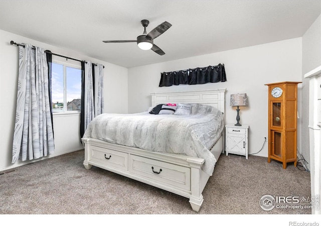 carpeted bedroom featuring ceiling fan