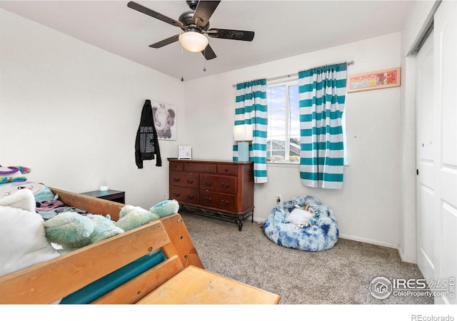 bedroom featuring carpet floors, a closet, and ceiling fan