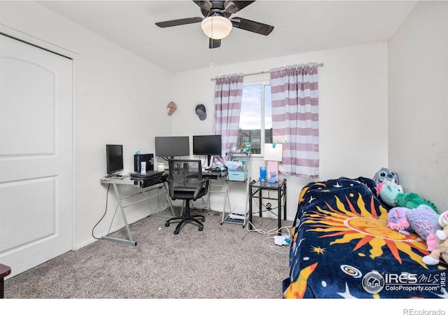 carpeted bedroom featuring ceiling fan