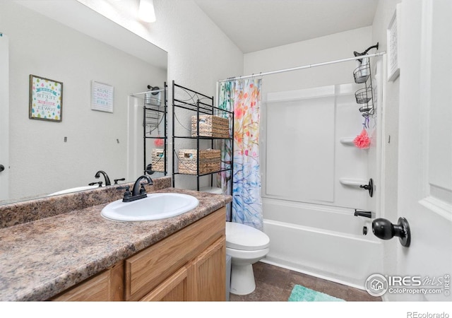 full bathroom featuring toilet, shower / bath combo, and vanity