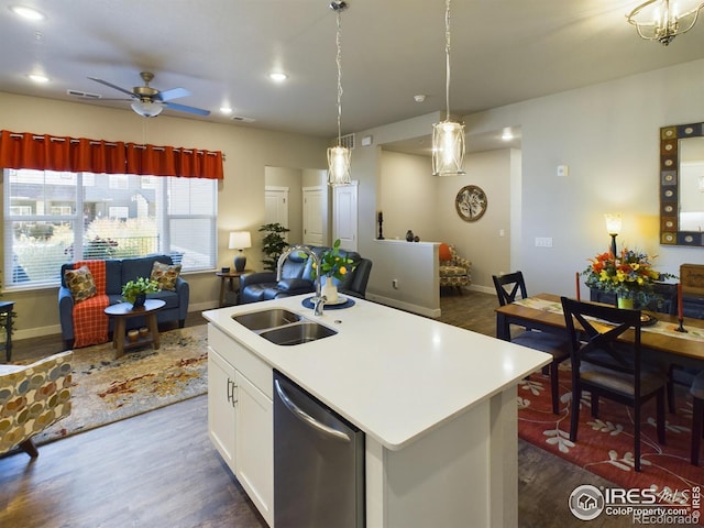 kitchen with white cabinetry, dishwasher, a center island with sink, and dark hardwood / wood-style flooring