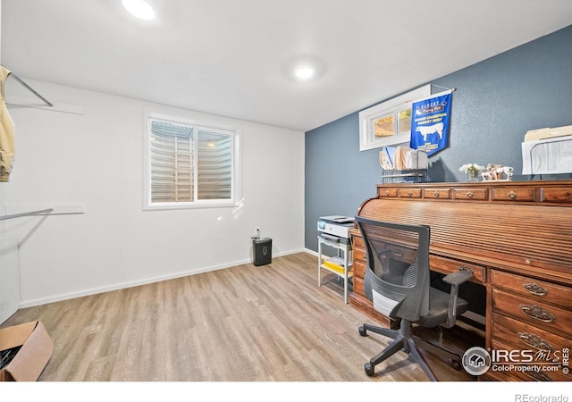 office with light hardwood / wood-style floors