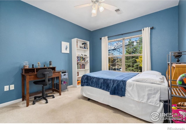 carpeted bedroom featuring ceiling fan