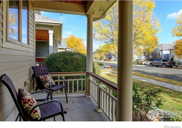 balcony featuring covered porch