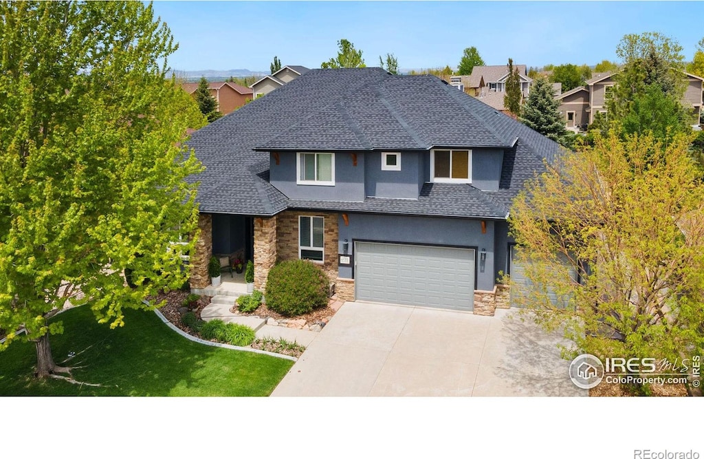 view of front property with a garage