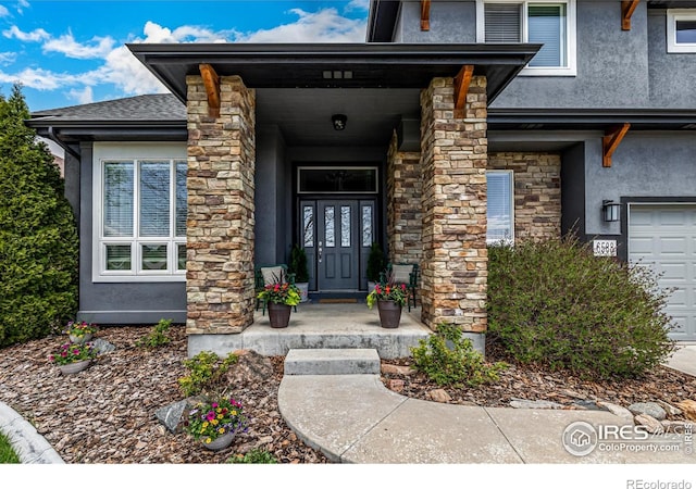 entrance to property featuring a porch