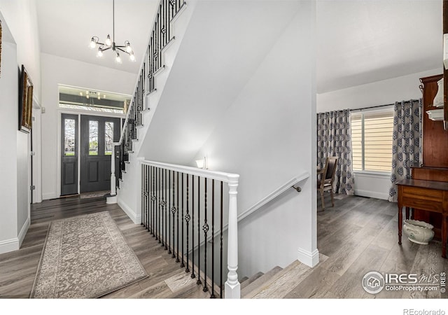 entrance foyer featuring a chandelier and hardwood / wood-style flooring