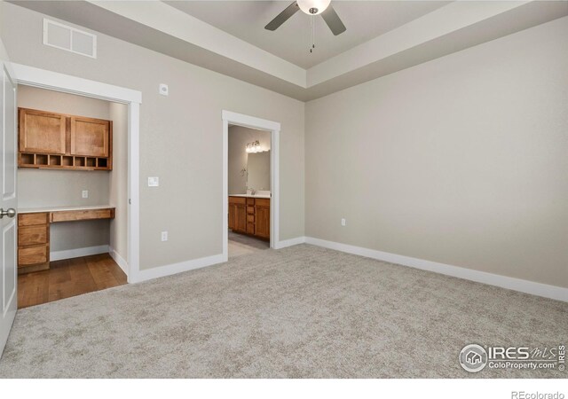 968 Birdwhistle Ln Unit 12, Fort Collins, CO 80524 - unfurnished bedroom with carpet floors, baseboards, and ensuite bathroom