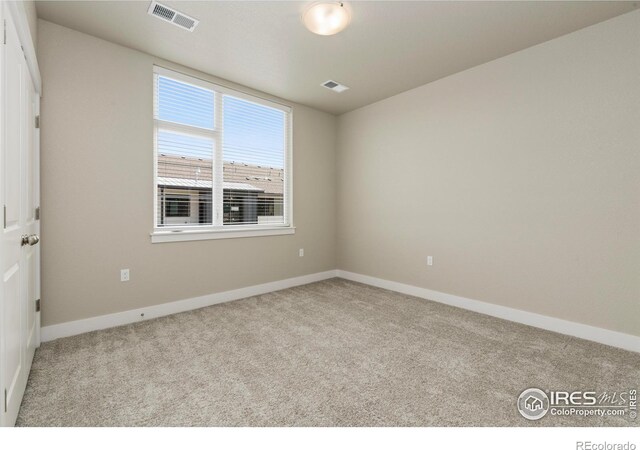 968 Birdwhistle Ln Unit 12, Fort Collins, CO 80524 - carpeted empty room with baseboards