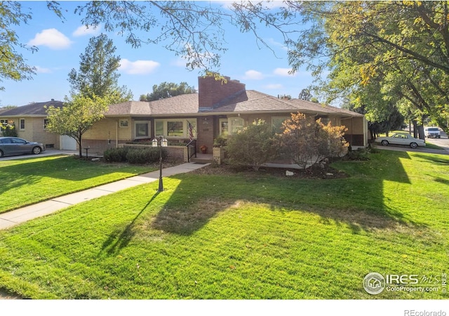 single story home with a front lawn and a garage