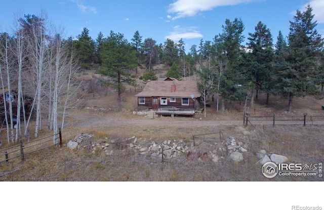 birds eye view of property featuring a rural view