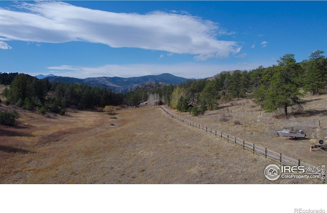 property view of mountains featuring a rural view