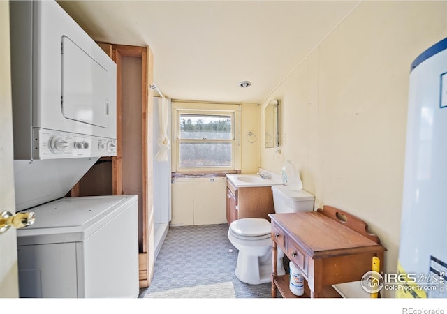 329 Snow Top Dr, Drake, CO 80515 - laundry area featuring estacked washer and dryer