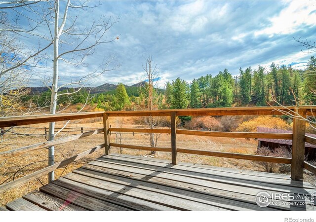 329 Snow Top Dr, Drake, CO 80515 - wooden terrace featuring a mountain view