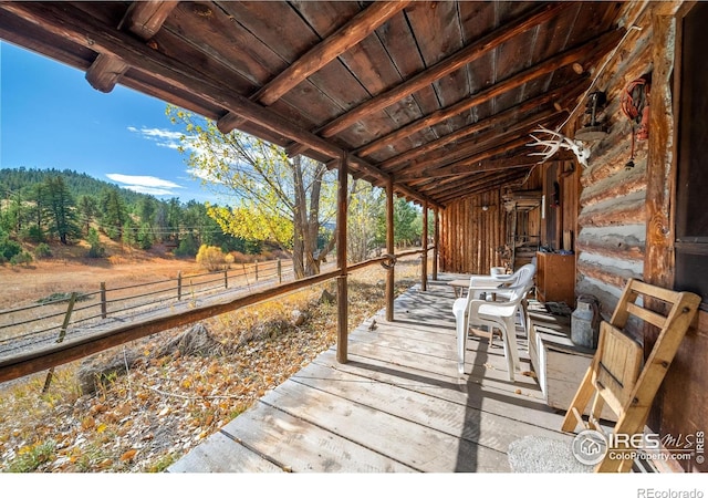 329 Snow Top Dr, Drake, CO 80515 - wooden deck featuring a view of trees