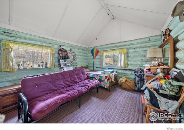 329 Snow Top Dr, Drake, CO 80515 - carpeted living area with log walls and high vaulted ceiling
