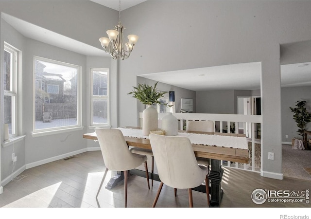 dining area with a chandelier