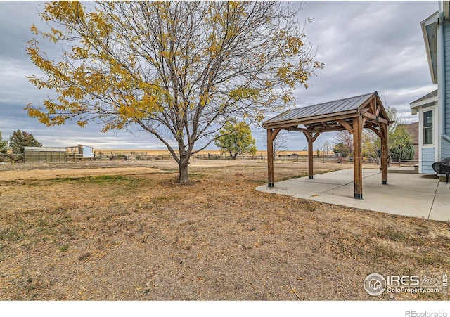 view of yard with a patio area and a gazebo