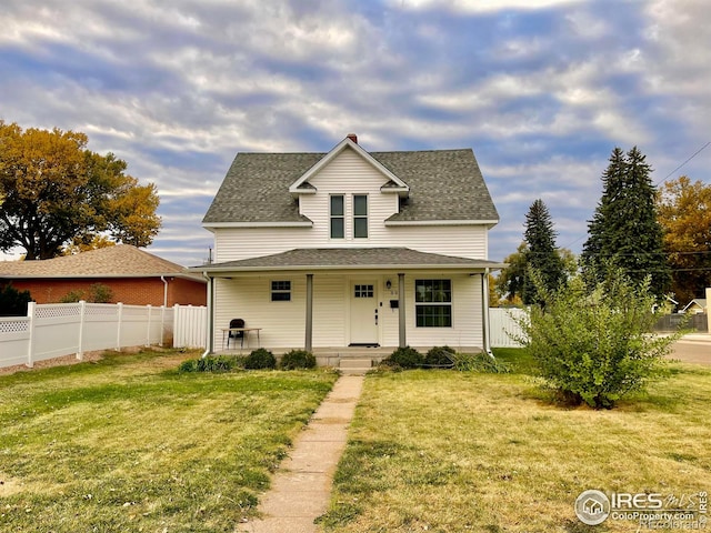 304 S High School Ave, Holyoke, CO 80734 - view of front of home featuring roof with shingles and covered porch