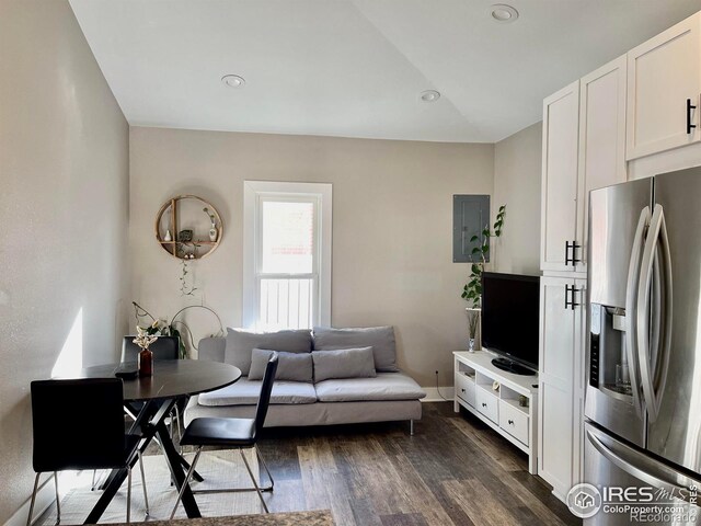 304 S High School Ave, Holyoke, CO 80734 - living room with electric panel, dark wood-type flooring, and recessed lighting