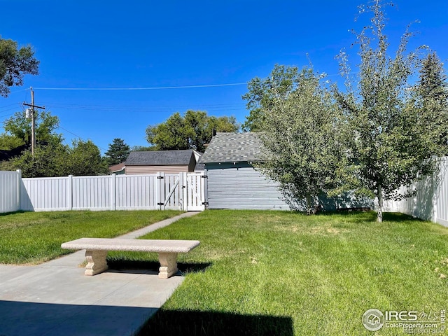 304 S High School Ave, Holyoke, CO 80734 - fenced backyard featuring a gate and a patio
