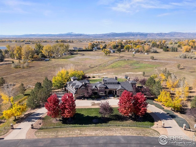 bird's eye view with a mountain view and a rural view