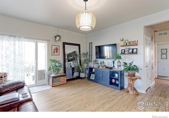 living room with hardwood / wood-style flooring