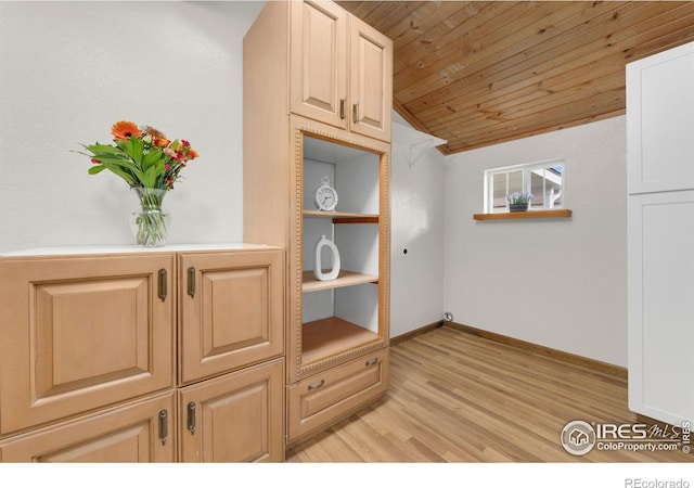 interior space featuring wood ceiling, vaulted ceiling, and light wood-type flooring