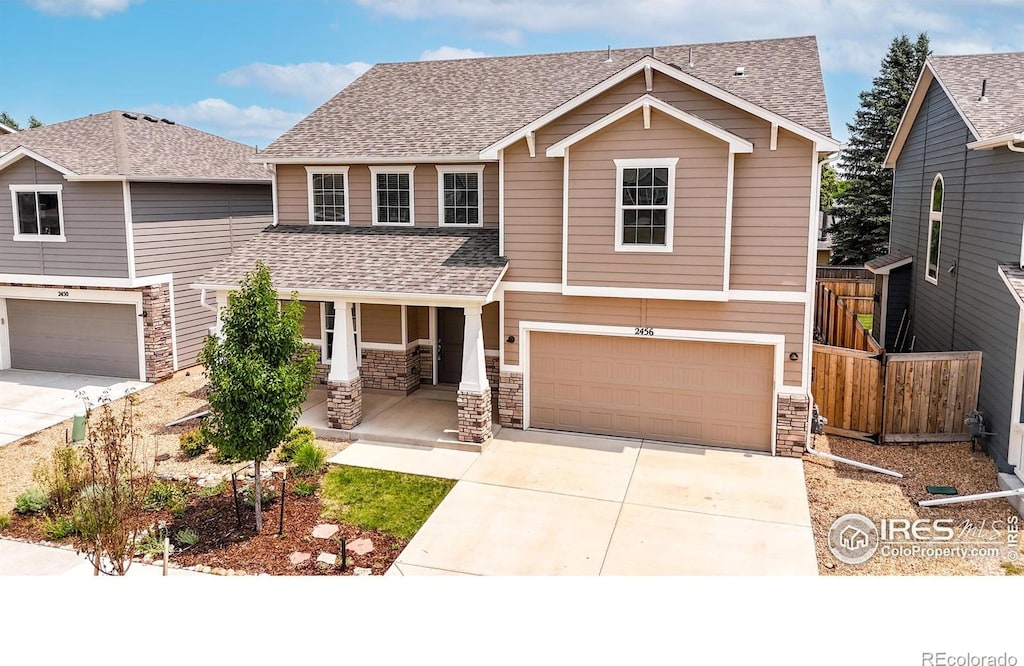 view of front of property with a garage