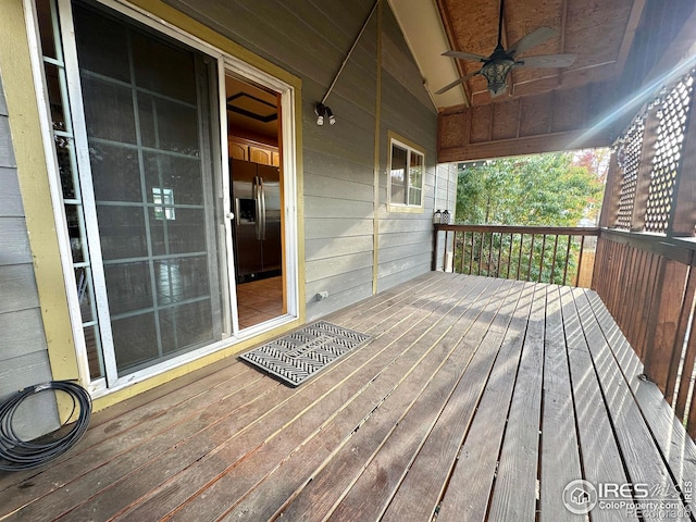 wooden terrace with ceiling fan