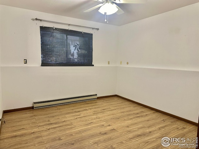 unfurnished room featuring light hardwood / wood-style floors, a baseboard heating unit, and ceiling fan