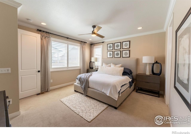 carpeted bedroom with crown molding and ceiling fan