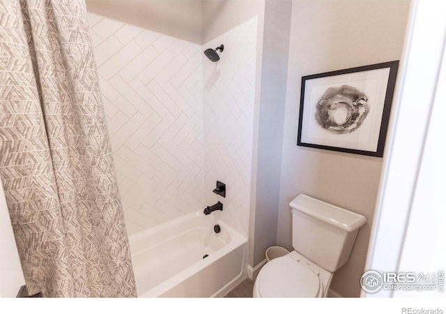 bathroom featuring toilet and shower / bathtub combination with curtain